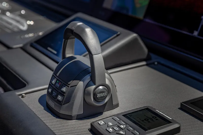 Slide: The Image of Control panel of 2025 Pershing GTX 80 yacht with Volvo Penta throttle. - 35