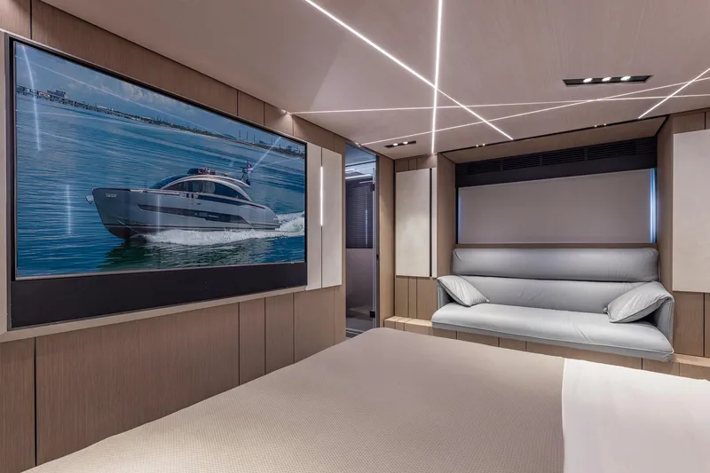 Slide: The Image of Luxurious interior of 2025 Pershing GTX 80 yacht with modern design and large screen. - 38