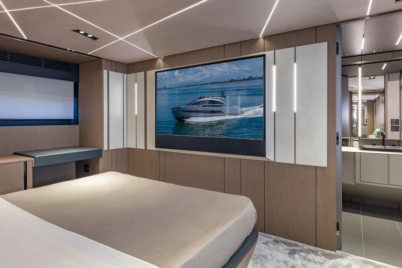 Slide: The Image of Luxurious interior of 2025 Pershing GTX 80 yacht with modern design and large screen. - 40