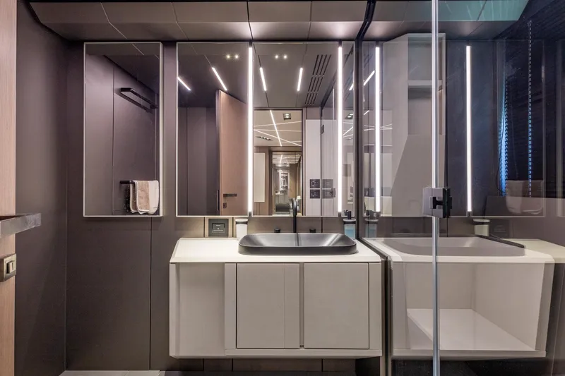 Slide: The Image of Luxurious bathroom interior on 2025 Pershing GTX 80 yacht, featuring modern design and sleek fixtures. - 43