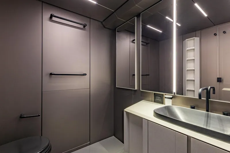 Slide: The Image of Luxurious bathroom interior of 2025 Pershing GTX 80 yacht, featuring modern fixtures and sleek design. - 44