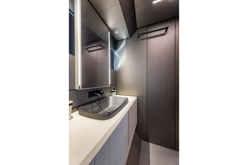 Slide: The Image of Modern bathroom interior on 2025 Pershing GTX 80 yacht, featuring sleek design and elegant fixtures. - 46
