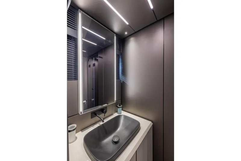 Slide: The Image of Modern bathroom interior of 2025 Pershing GTX 80 yacht with sleek design and lighting. - 48