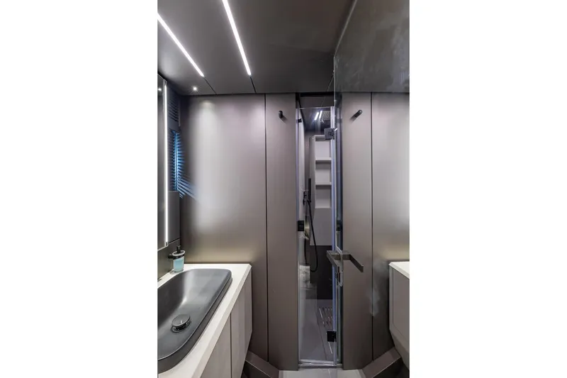 Slide: The Image of Modern bathroom interior of 2025 Pershing GTX 80 yacht with sleek design and lighting. - 49