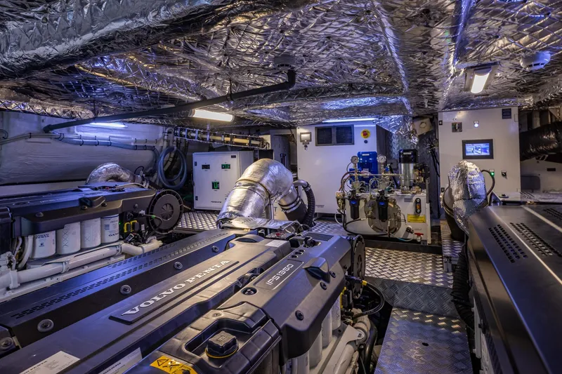 Slide: The Image of Engine room of 2025 Pershing GTX 80 yacht with Volvo Penta engines and advanced equipment. - 54