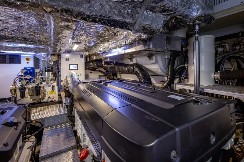 Slide: The Image of Engine room of 2025 Pershing GTX 80 yacht, showcasing advanced machinery and equipment. - 55