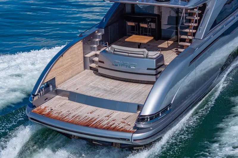 Slide: The Image of Luxury Pershing GTX 80 yacht cruising on water, showcasing sleek design and spacious deck, 2025 model. - 6