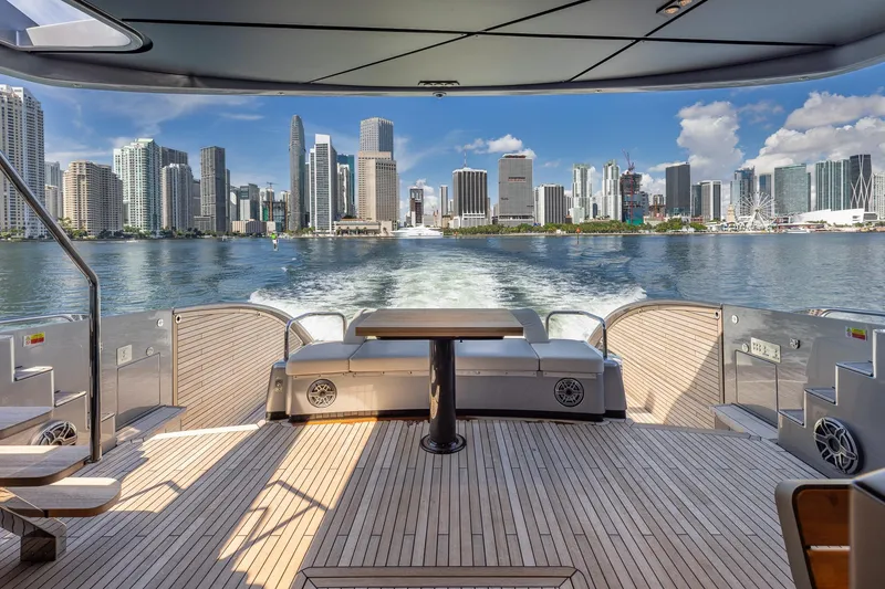 Slide: The Image of Luxury Pershing GTX 80 yacht cruising with city skyline view, 2025 model. - 7
