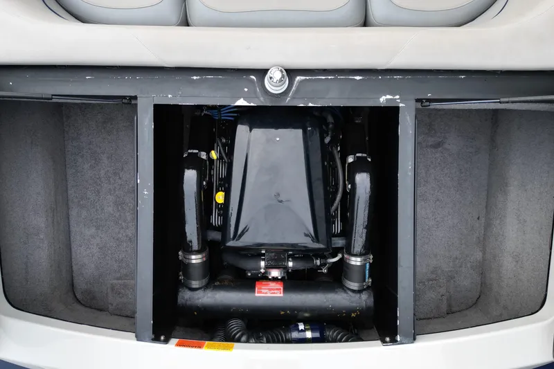 Slide: The Image of 2009 Malibu Wakesetter VTX engine compartment, showcasing internal components and layout. - 15