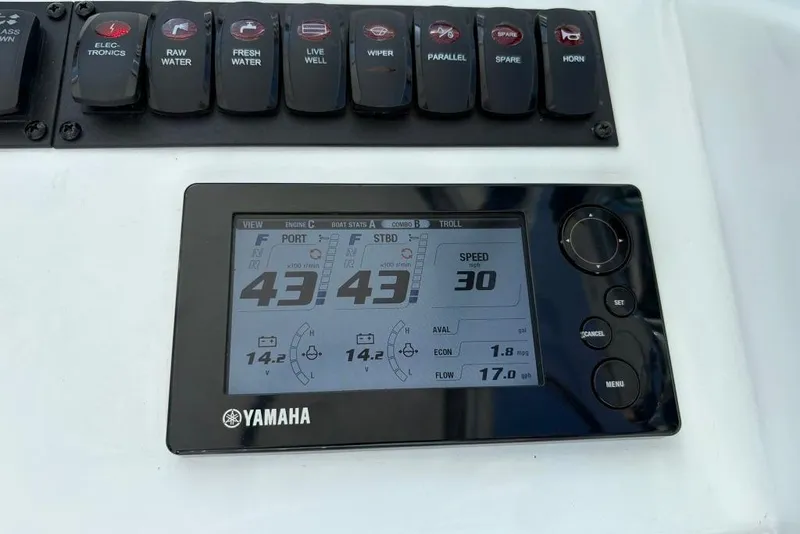 Slide: The Image of Control panel of a 2019 Albemarle 25 Express boat with Yamaha display. - 11