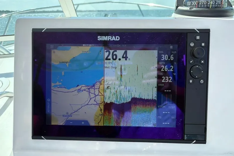 Slide: The Image of Simrad display on 2019 Albemarle 25 Express showing navigation and sonar data. - 9