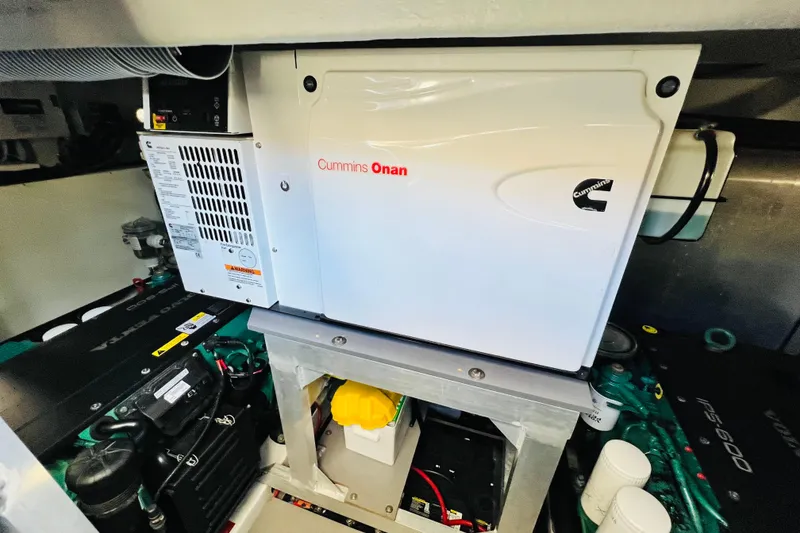 Slide: The Image of Engine room of 2014 Beneteau Swift Trawler 50 with Cummins Onan generator. - 20