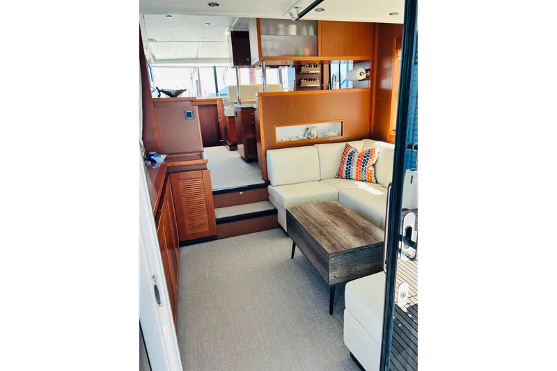 Slide: The Image of Luxurious interior of 2014 Beneteau Swift Trawler 50 with modern furnishings and elegant design. - 22
