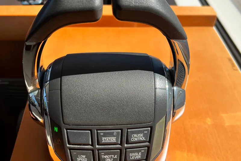 Slide: The Image of Control panel of a 2014 Beneteau Swift Trawler 50, featuring various navigation buttons. - 31