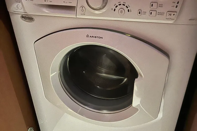 Slide: The Image of Ariston washing machine inside 2014 Beneteau Swift Trawler 50 yacht. - 44