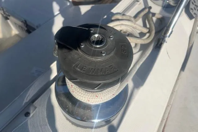 Slide: The Image of Winch on 1987 Sabre 42 K/CB sailboat deck with ropes and Lewmar branding. - 25