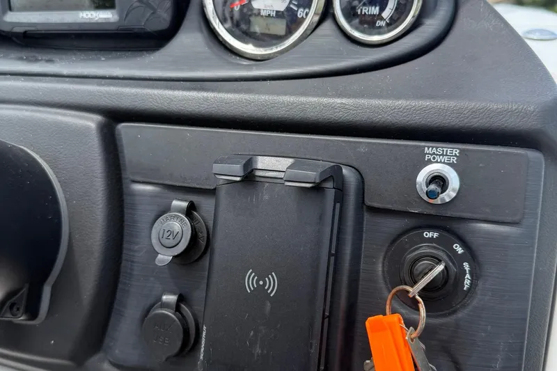 Slide: The Image of Control panel of 2025 Berkshire 24E CTS 2.75 with gauges and power switches. - 12