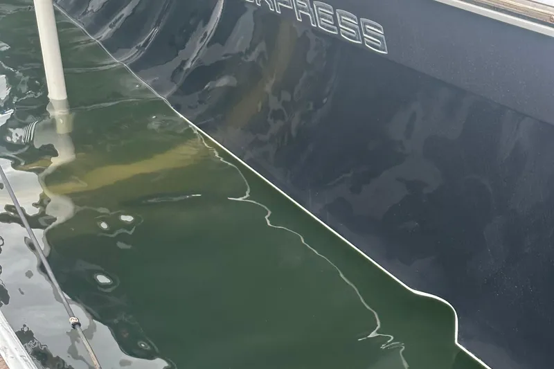 Slide: The Image of 2016 Midnight Express 37 Open boat partially submerged in water. - 13