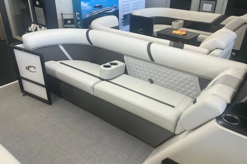 Slide: The Image of Luxurious seating on 2025 Crest 240 Classic LX SLSC pontoon boat, featuring elegant design and comfort. - 11