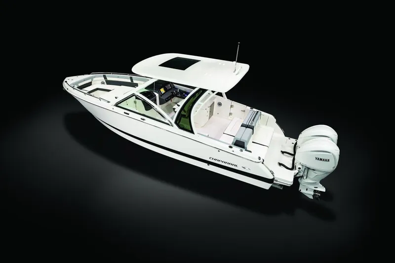 Slide: The Image of 2026 Chaparral 310 OSX boat with Yamaha engines, sleek design, and modern features. - 1
