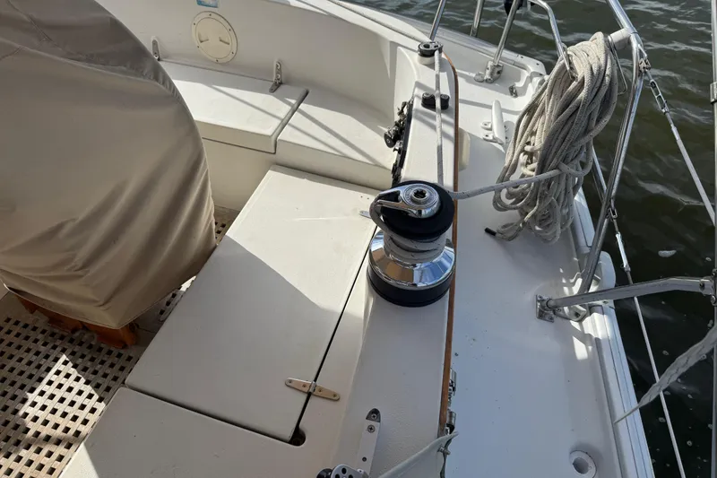 Slide: The Image of Cockpit of 1988 Nonsuch 36 sailboat with winch and coiled rope. - 10