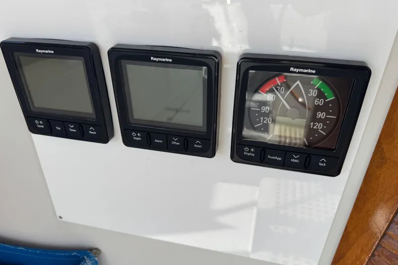 Slide: The Image of Raymarine instrument panel on 1988 Nonsuch 36 sailboat, featuring digital displays and gauges. - 20