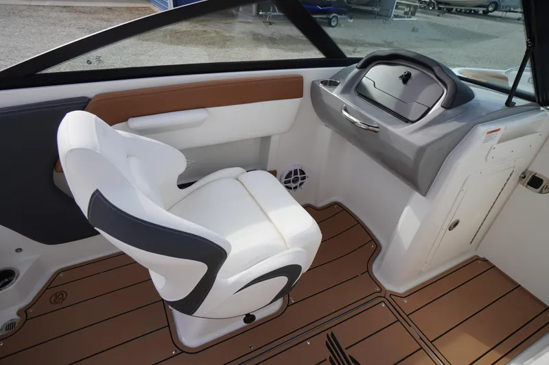 Slide: The Image of Interior of 2026 Chaparral 21 SSi boat with modern seating and dashboard design. - 17