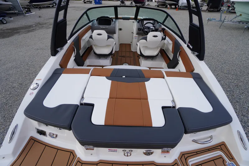 Slide: The Image of 2026 Chaparral 21 SSi boat interior with stylish seating and modern dashboard design. - 30