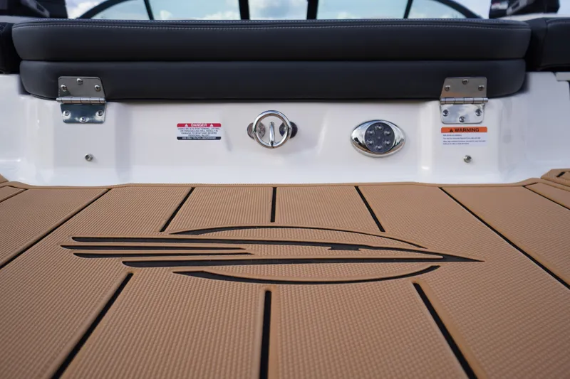 Slide: The Image of 2026 Chaparral 21 SSi boat deck with logo and safety warnings. - 37