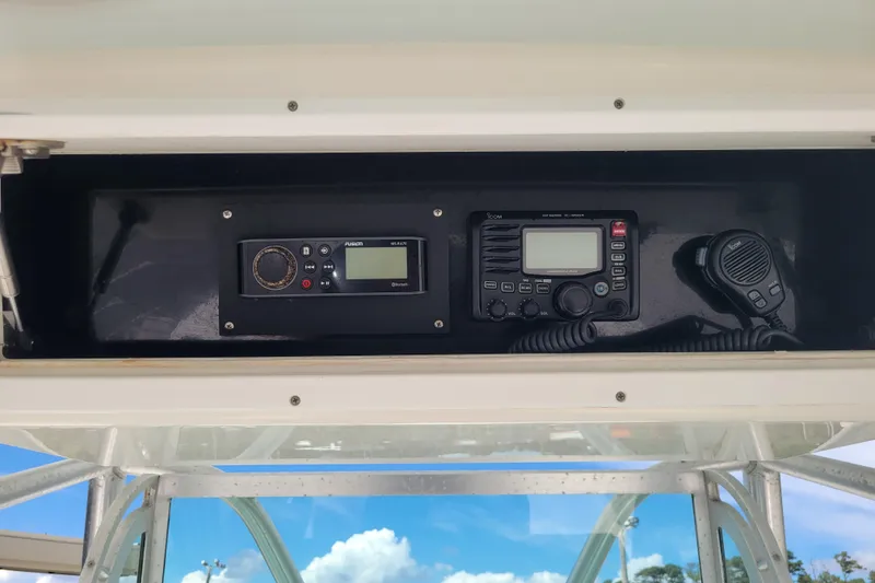 Slide: The Image of 2006 Regulator 29 Forward Seating boat console with radio and communication equipment. - 12