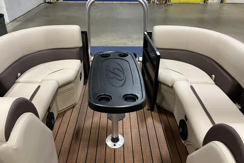 Slide: The Image of 2026 Bentley Pontoons 223 NAVIGATOR interior with modern seating and control panel. - 2