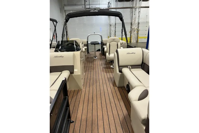 Slide: The Image of 2026 Bentley Pontoons 223 NAVIGATOR interior with gray seating and flooring. - 4