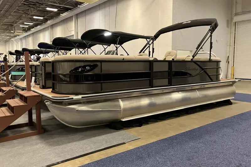 Slide: The Image of 2026 Bentley Pontoons 223 NAVIGATOR interior with luxurious seating and spacious layout. - 5