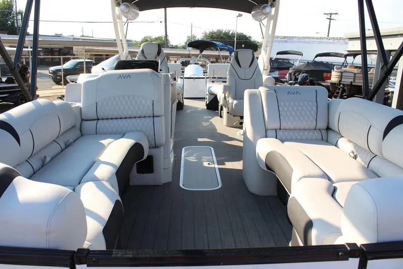 Slide: The Image of Luxurious interior of 2026 Avalon Excalibur LTD Quad Lounge 25 FT pontoon boat. - 17