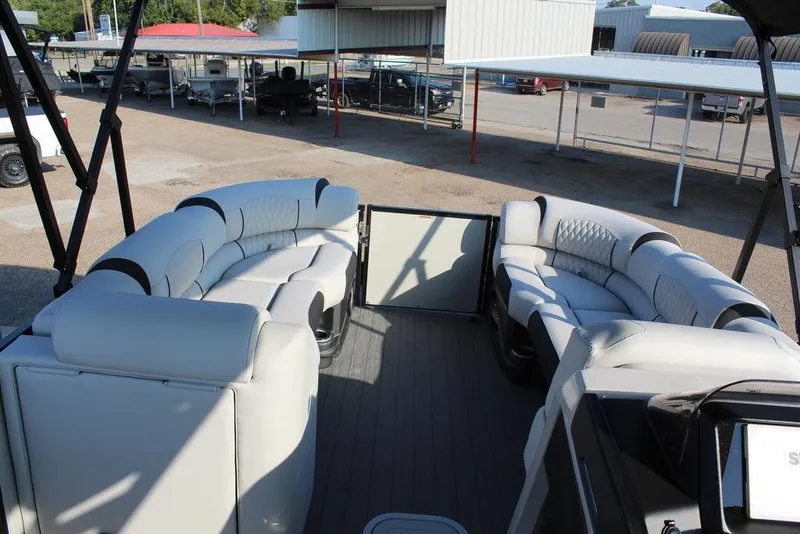 Slide: The Image of Luxurious seating on 2026 Avalon Excalibur LTD Quad Lounge 25 FT pontoon boat. - 25