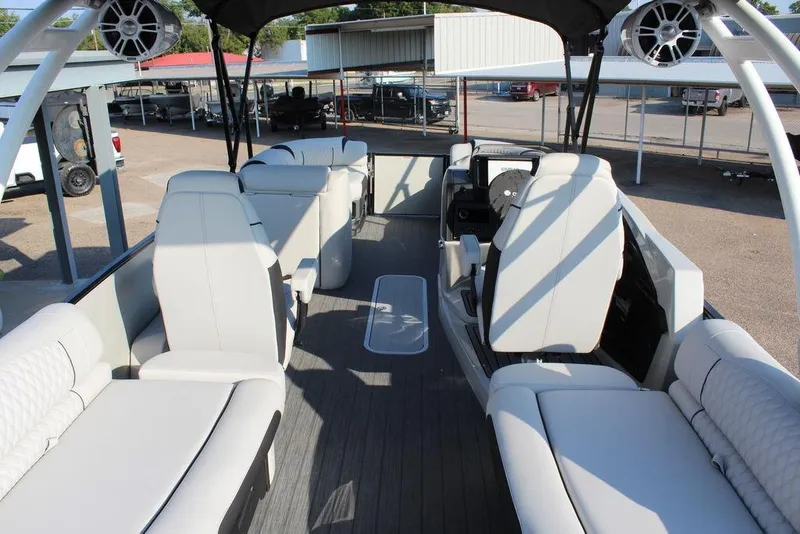 Slide: The Image of 2026 Avalon Excalibur LTD Quad Lounge 25 FT interior with luxurious seating and modern design. - 26