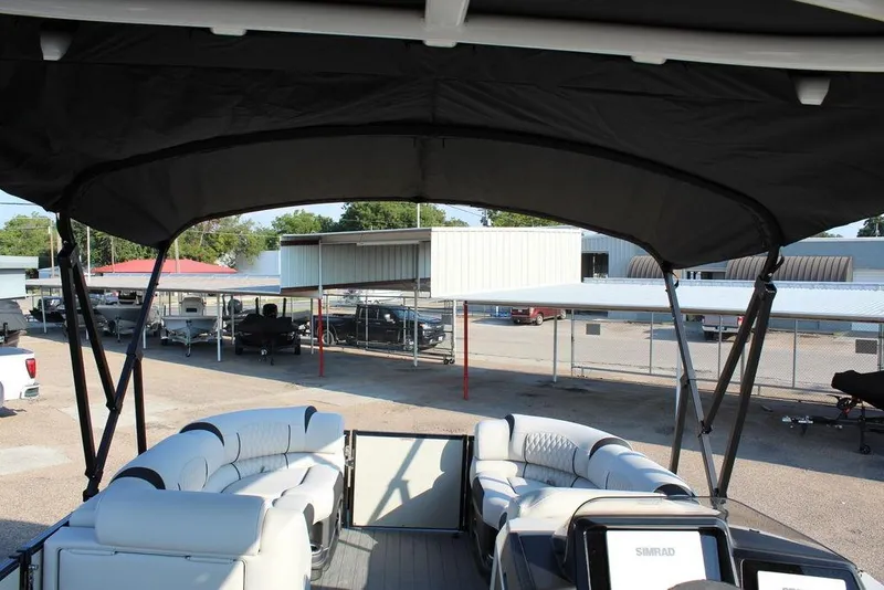 Slide: The Image of 2026 Avalon Excalibur LTD Quad Lounge 25 FT pontoon boat interior with canopy. - 28