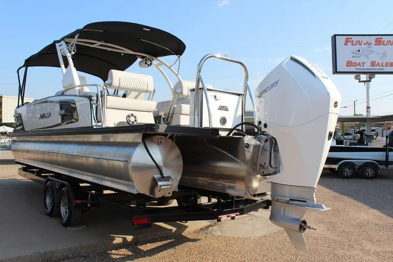Slide: The Image of 2026 Avalon Excalibur LTD Quad Lounge 25 FT pontoon boat with Mercury outboard motor. - 6