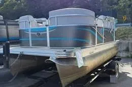 Slide: The Image of 2019 Qwest LS 714 Lanai Cruise pontoon boat on trailer, silver and blue design. - 5