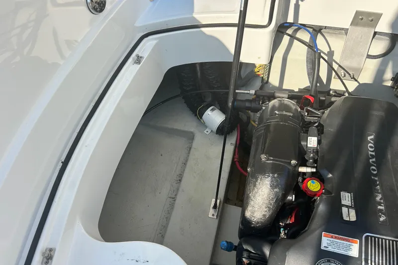 Slide: The Image of Engine compartment of a 2011 Cobalt 242 boat with Volvo Penta engine. - 13