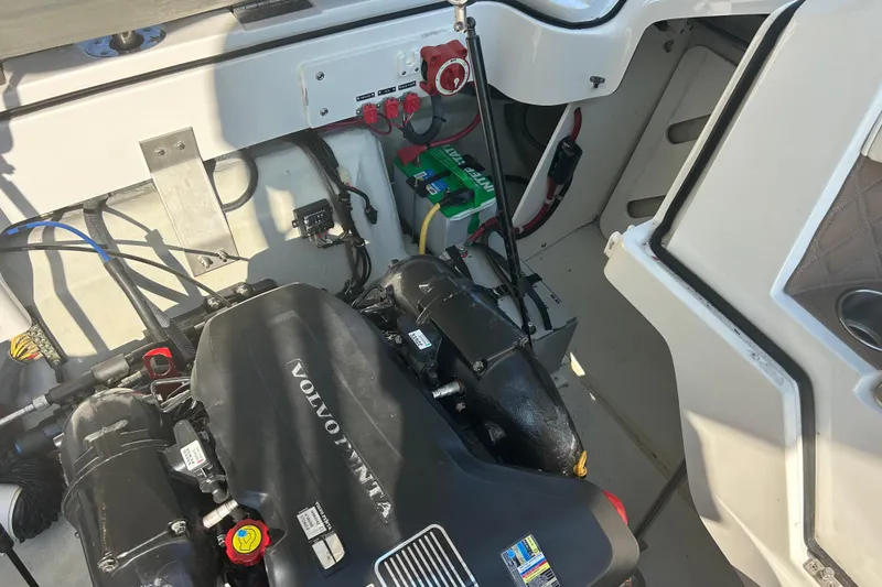 Slide: The Image of Engine compartment of a 2011 Cobalt 242 boat with Volvo Penta engine. - 14