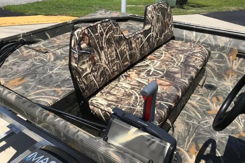 Slide: The Image of 2026 War Eagle 754LDSV boat with camouflage seating and interior design. - 3