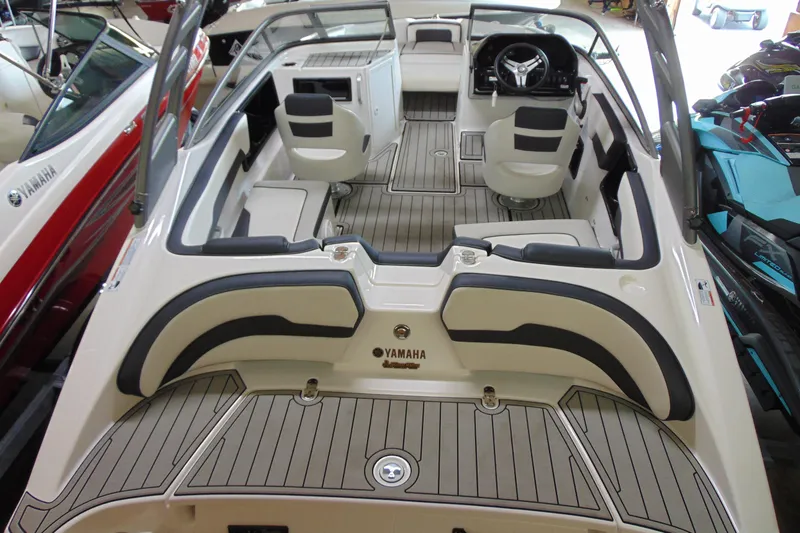 Slide: The Image of 2020 Yamaha Boats 195S interior with seating and steering wheel, showcasing modern design. - 3