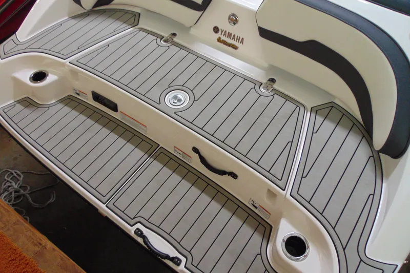 Slide: The Image of 2020 Yamaha Boats 195S swim platform with gray decking and black accents. - 4