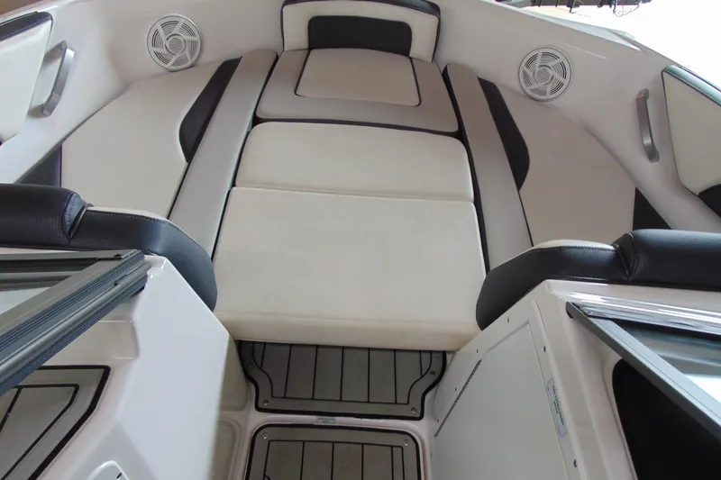 Slide: The Image of 2020 Yamaha Boats 195S interior with cushioned seating and built-in speakers. - 8