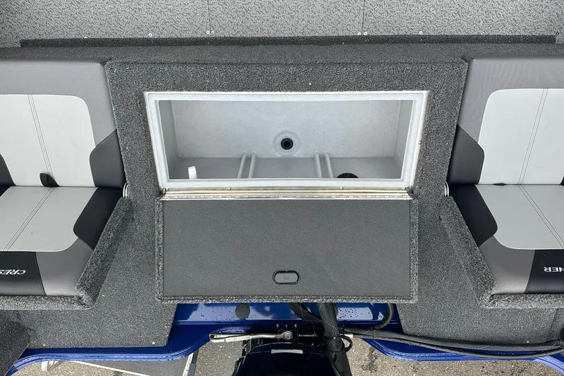 Slide: The Image of 2025 Crestliner 1750 Hawk boat interior with storage compartment and seating. - 15