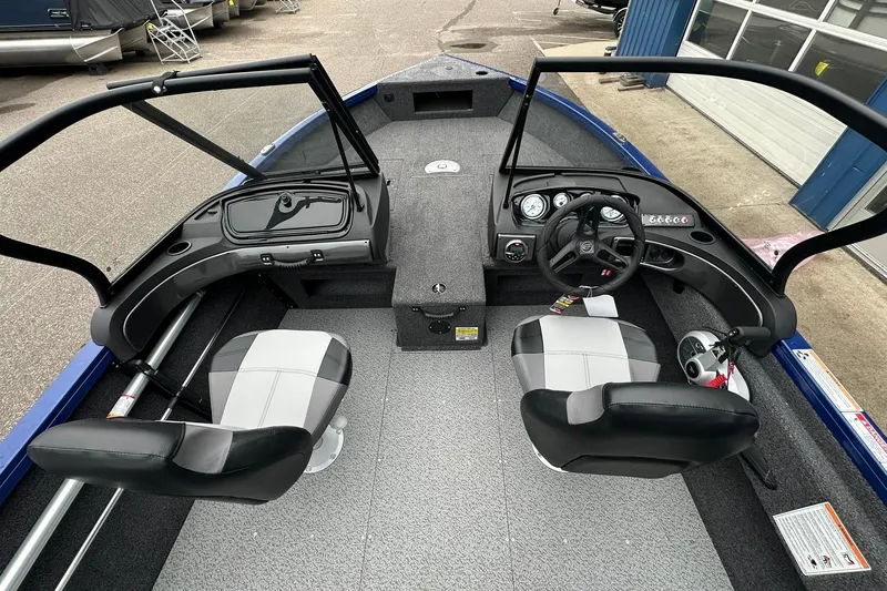 Slide: The Image of 2025 Crestliner 1750 Hawk boat interior with dual seats and control panel. - 18