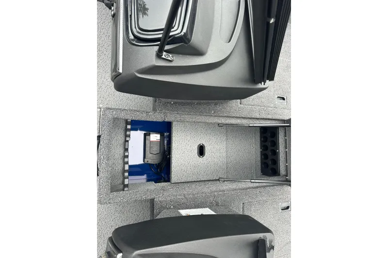 Slide: The Image of 2025 Crestliner 1750 Hawk boat interior with storage compartments and equipment. - 19