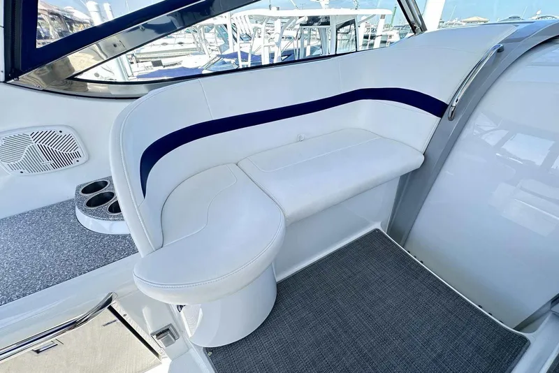 Slide: The Image of 2007 Formula 40 Performance Cruiser interior with white seating and cup holders. - 11