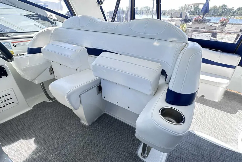 Slide: The Image of 2007 Formula 40 Performance Cruiser interior with white seating and cup holder. - 13